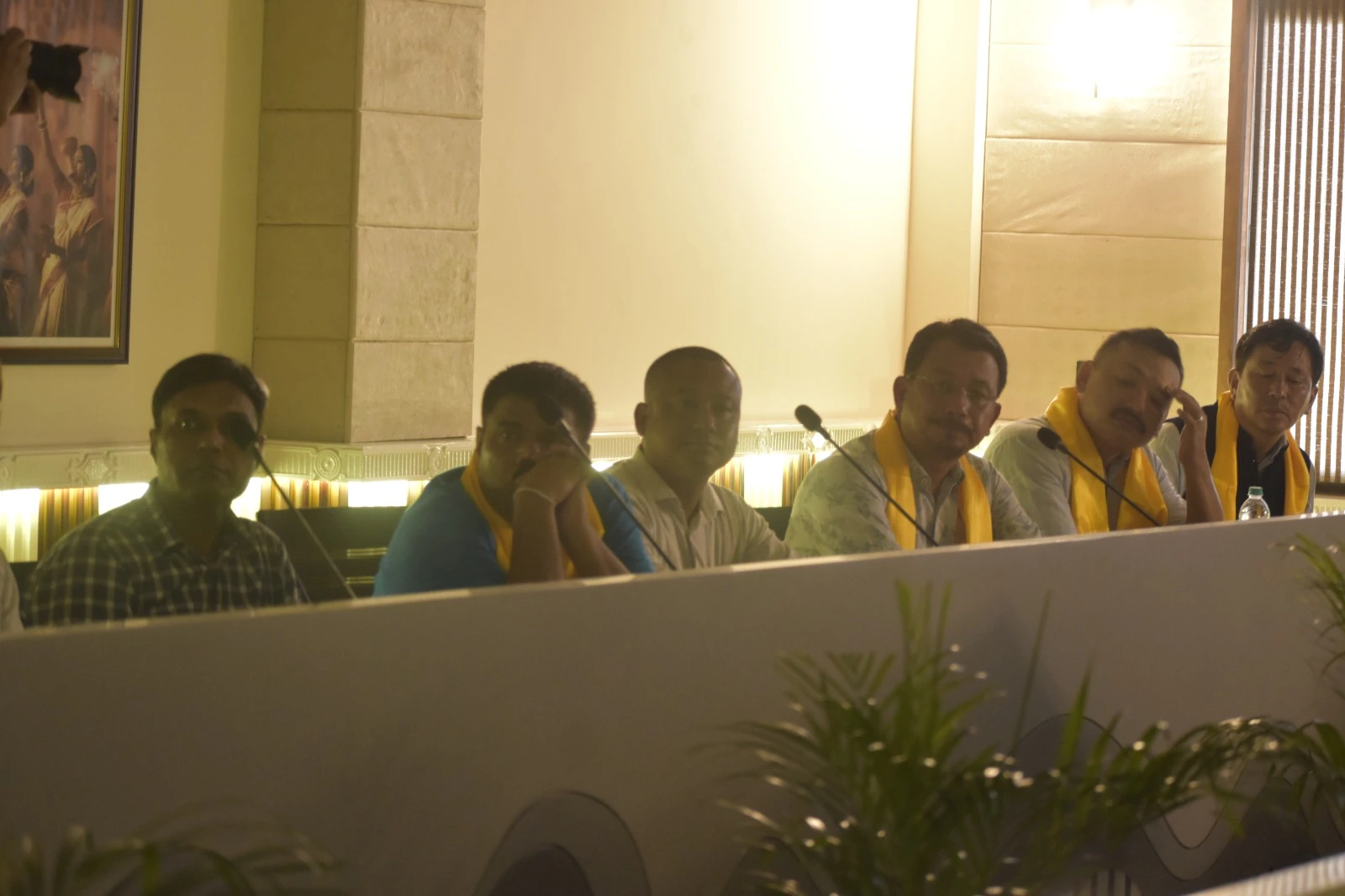 Visitors seated together at the college