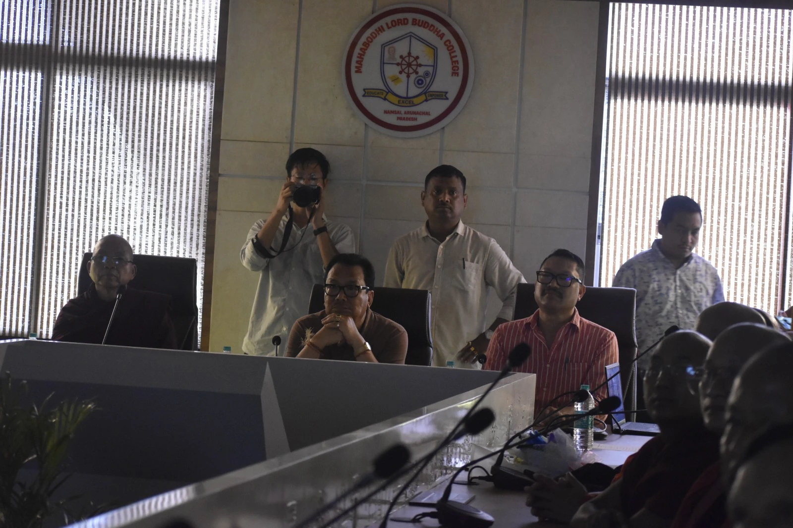 A discussion in the college meeting room